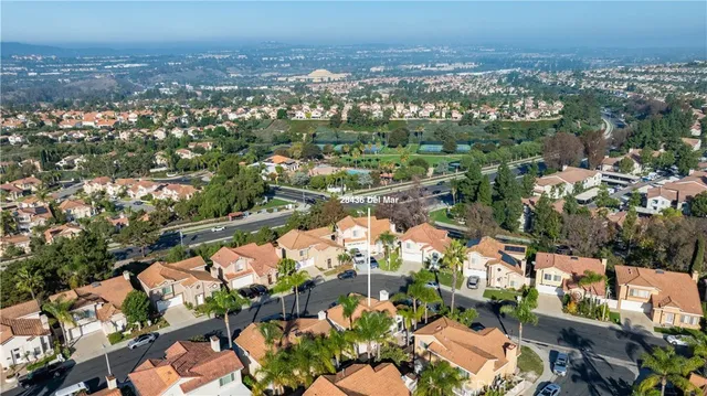 an aerial view of a city with lots of residential buildings