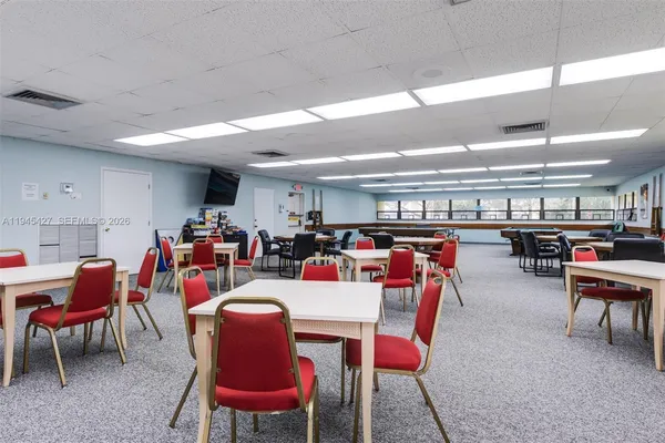 a view of a dining room with furniture