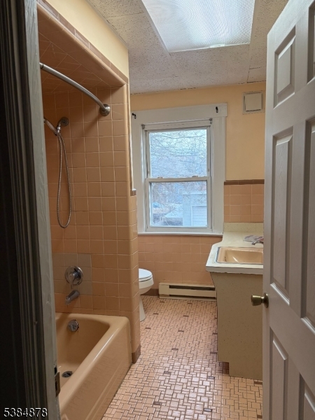 412 South Valley Road Orange, NJ 07050 - Photo 14 of 18 a bathroom with a bathtub sink and toilet