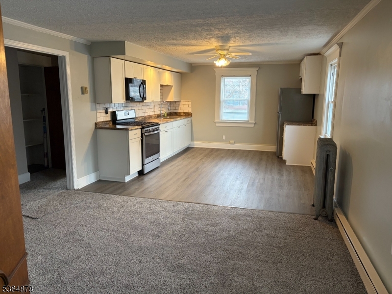 412 South Valley Road Orange, NJ 07050 - Photo 16 of 18 a view of kitchen with sink refrigerator and window
