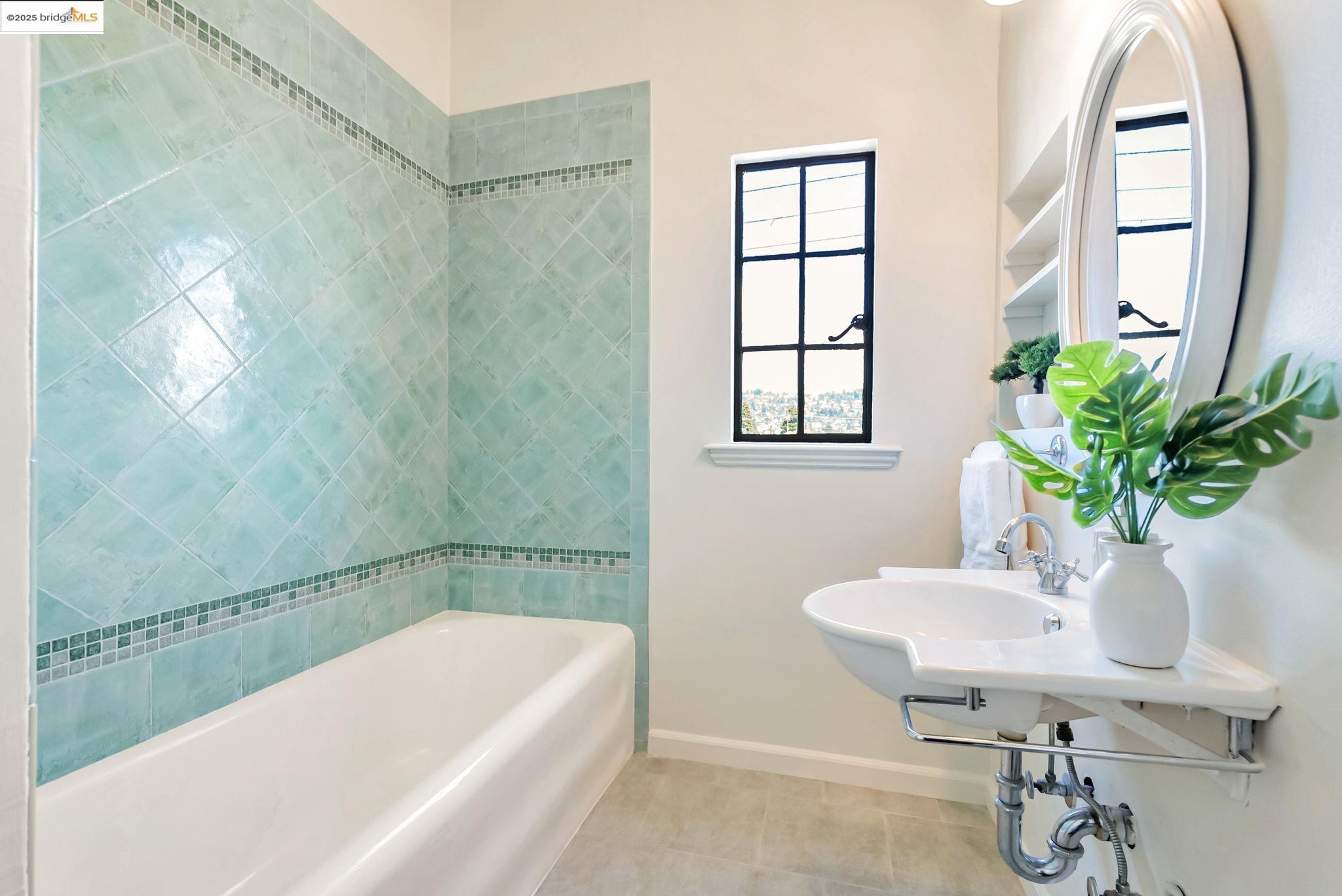848 Stannage Avenue, Unit 11 Albany, CA 94706 - Photo 16 of 24 Full bath with baseboards and tile patterned floors