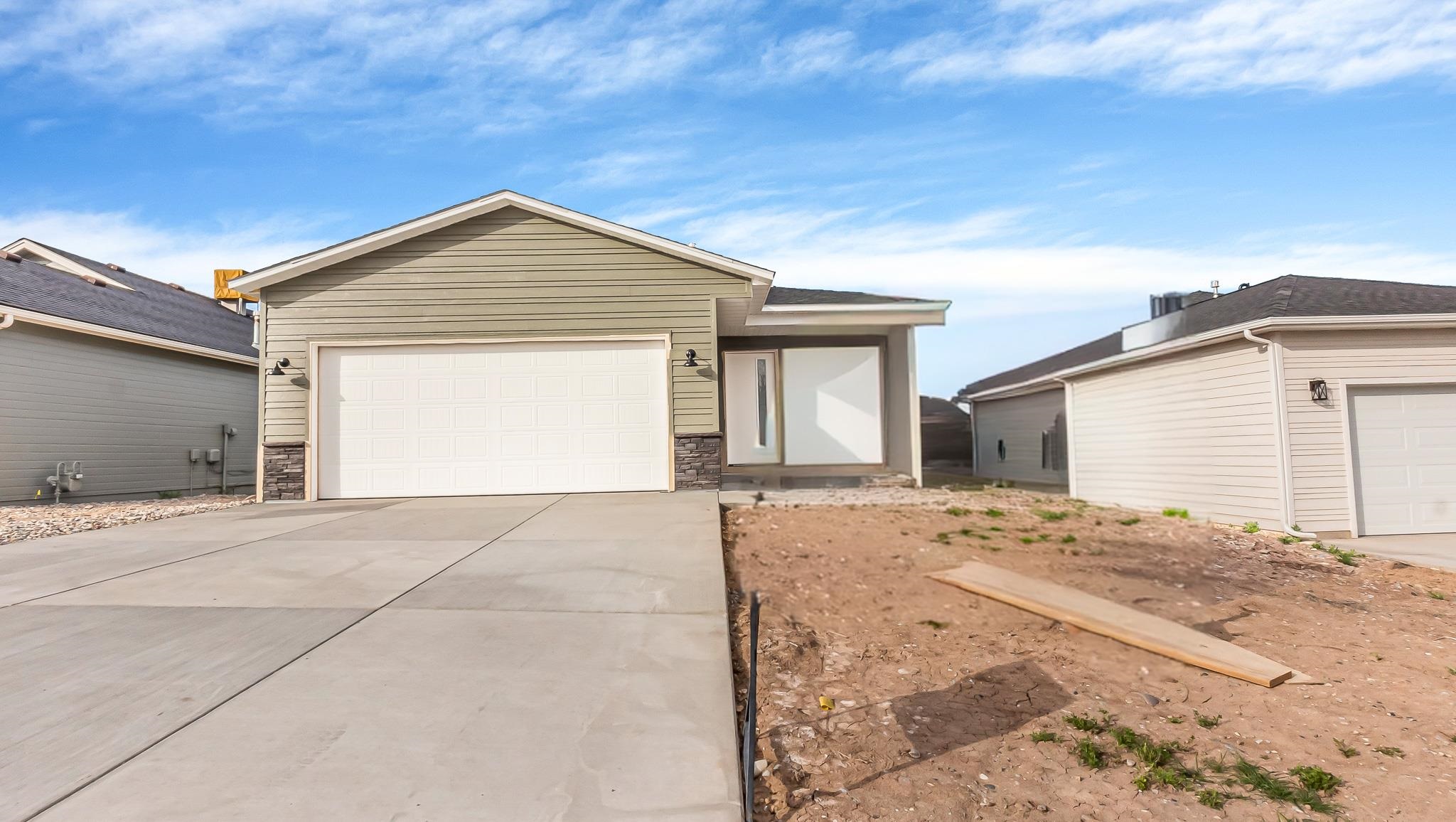 214 Limberpine Circle Parachute, CO 81635 - Photo 2 of 24 a view of backyard of house