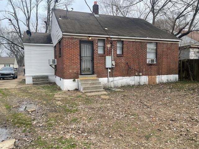 1249 Maria Street Memphis, TN 38122 - Photo 2 of 12 View of front of property with entry steps, a chimney, and brick siding