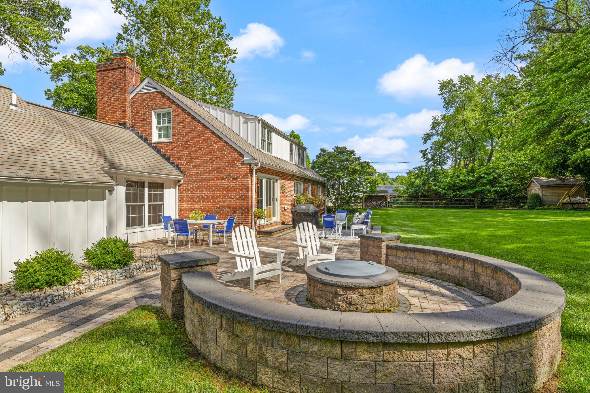 574 Timber Lane Devon, PA 19333 - Photo 15 of 71 Stone patio with built-in firepit