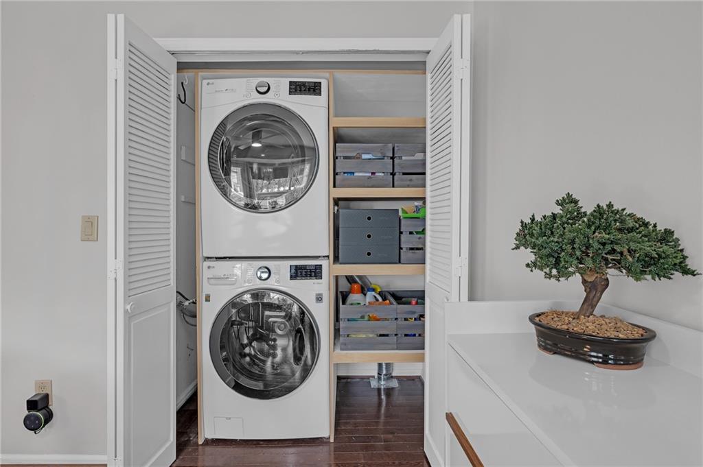1206 Defoor Court Northwest, Unit 2A Atlanta, GA 30318 - Photo 13 of 36 a view of living room washer and dryer