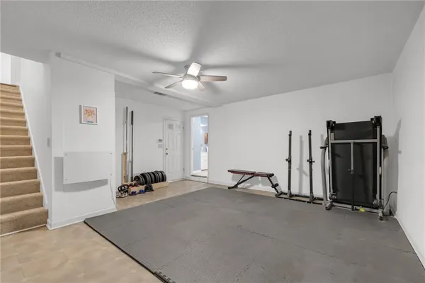 a view of room with gym equipment