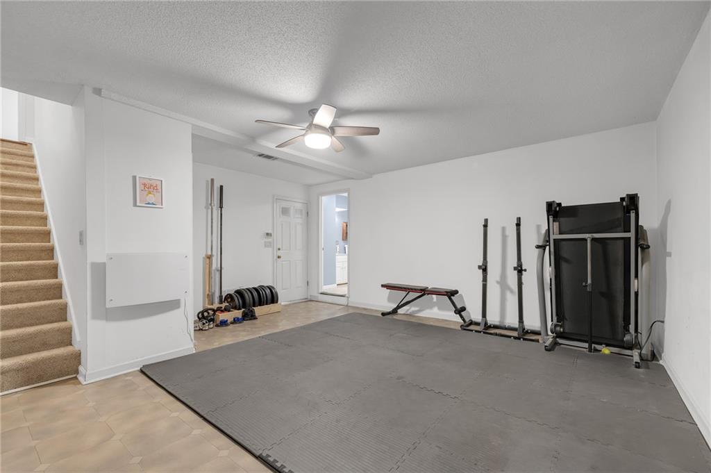 1206 Defoor Court Northwest, Unit 2A Atlanta, GA 30318 - Photo 26 of 36 a view of room with gym equipment
