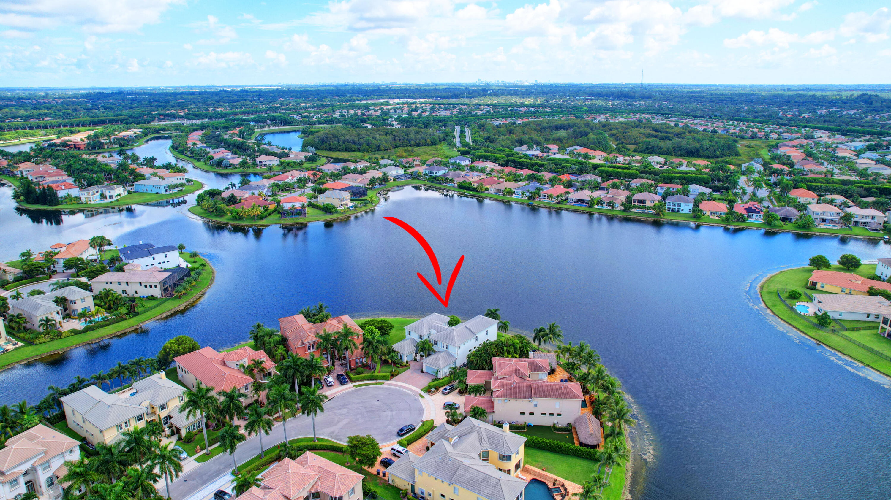 2742 Treanor Terrace Wellington, FL 33414 - Photo 36 of 44 an aerial view of ocean and residential houses with outdoor space