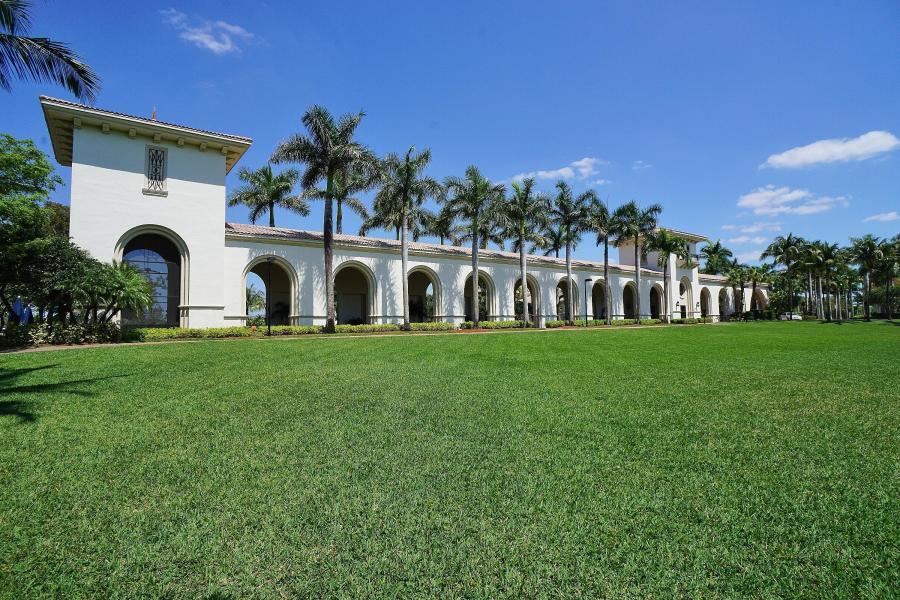 2742 Treanor Terrace Wellington, FL 33414 - Photo 44 of 44 a view of house with garden and tall trees
