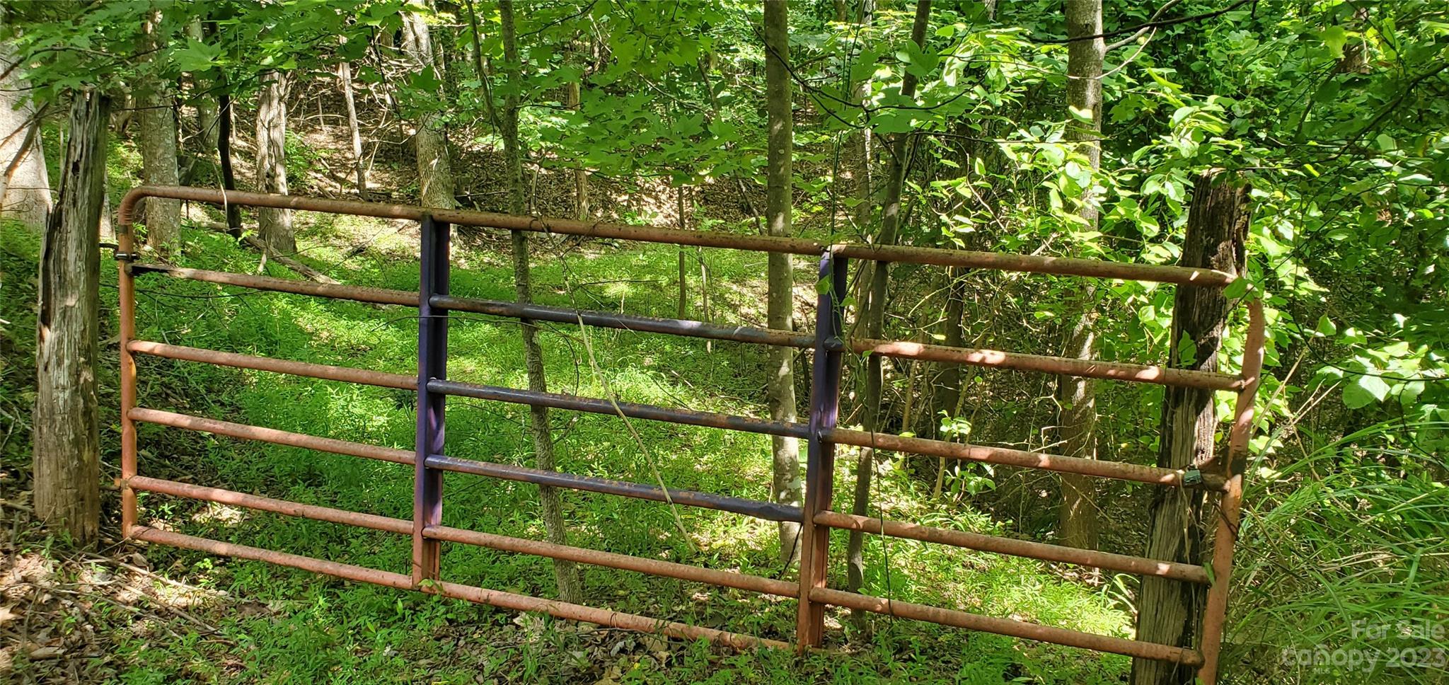 2440 Alfred Hartley Road Lenoir, NC 28645 - Photo 5 of 17 a view of a fence from a window