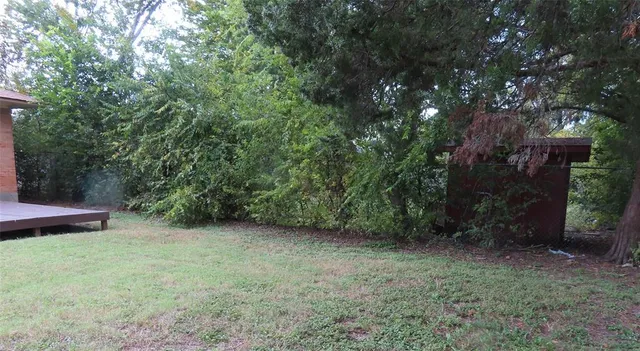 a view of outdoor space and yard