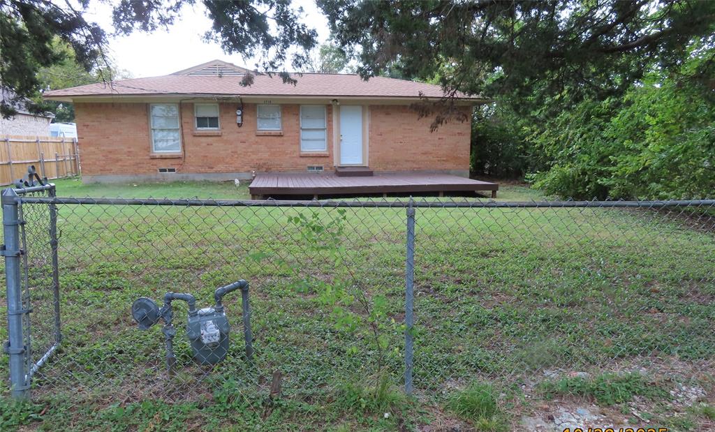 1719 Andrew Street Mesquite, TX 75149 - Photo 10 of 12 a front view of a house with a yard