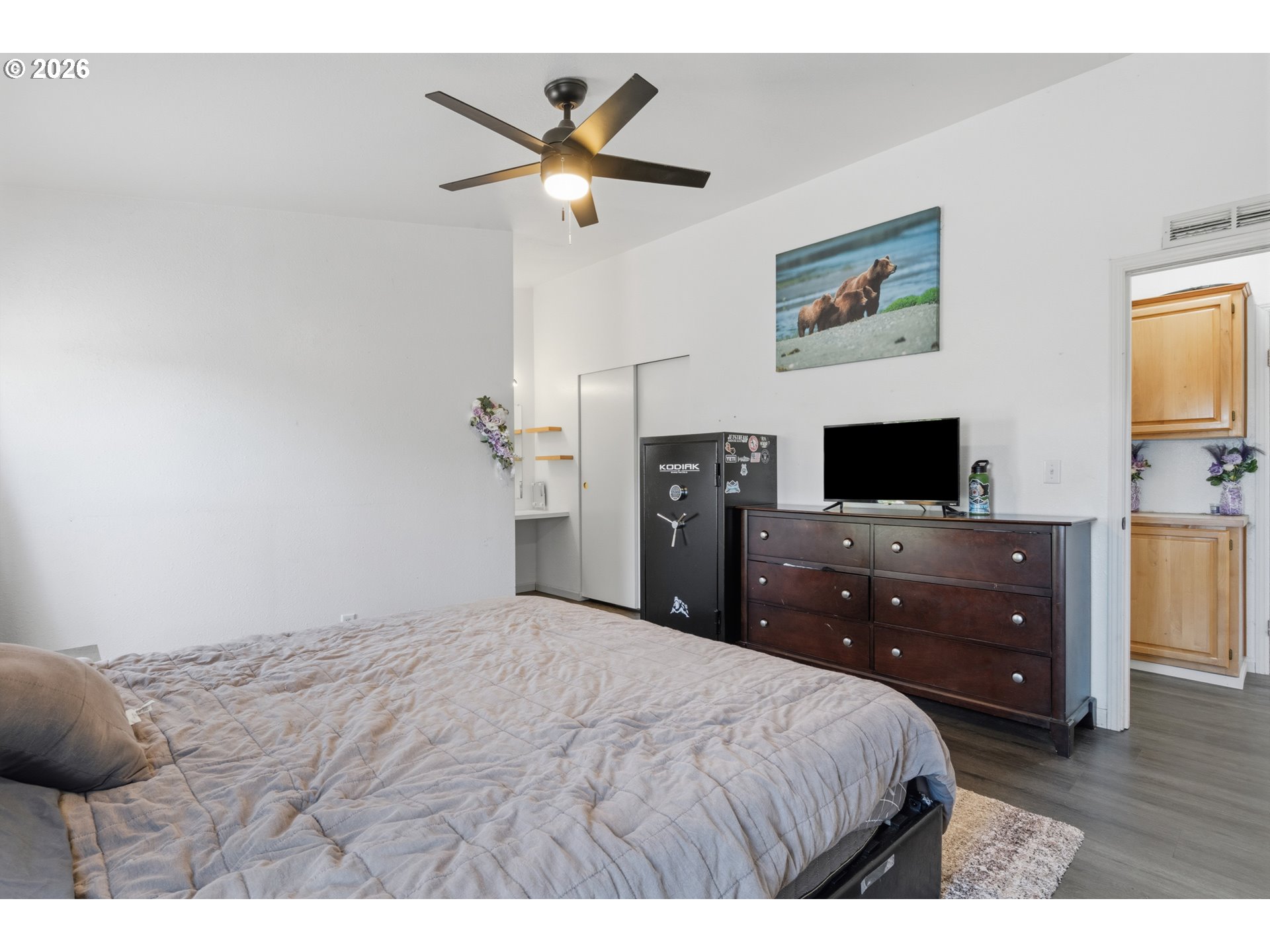 2151 Three Lakes Road Southeast Albany, OR 97322 - Photo 18 of 25 a bedroom with a bed and a flat screen tv