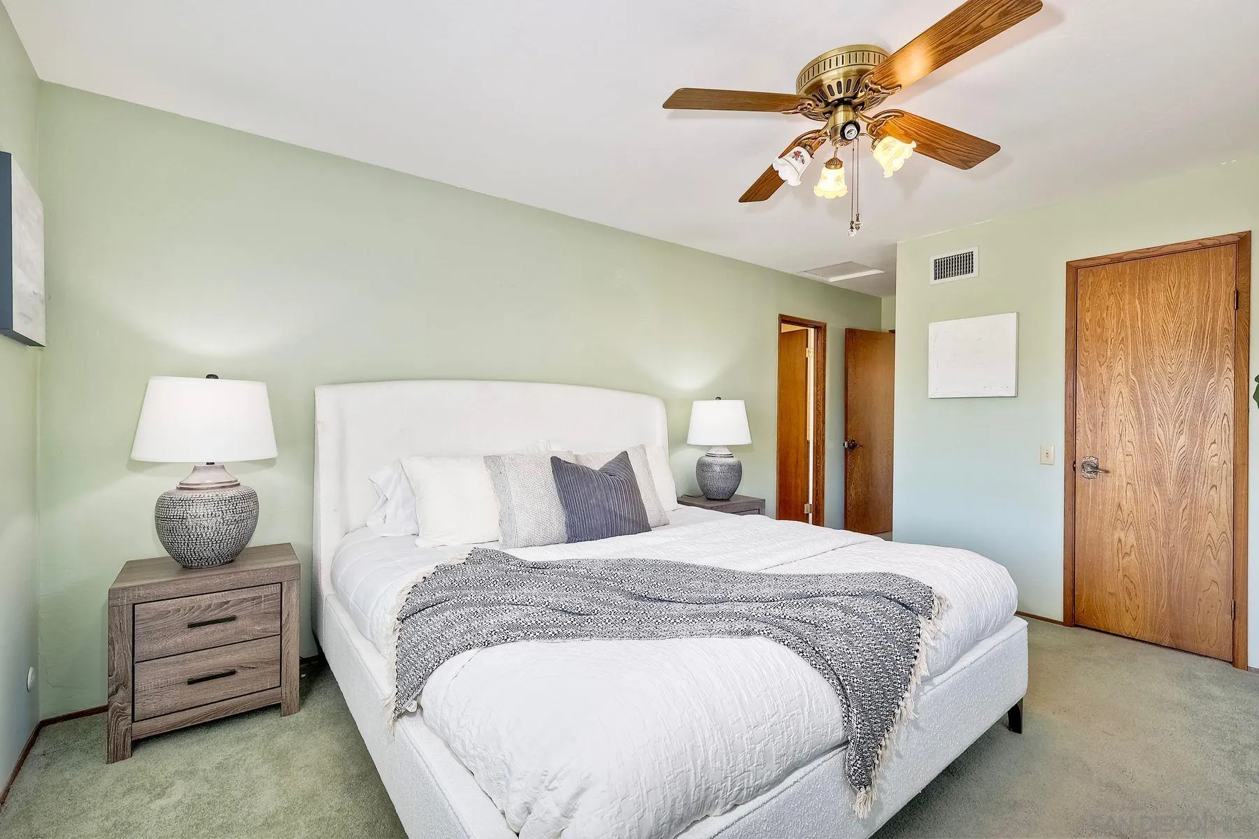 1346 Pepper Villa Drive El Cajon, CA 92021 - Photo 16 of 25 a bedroom with a bed and a chandelier