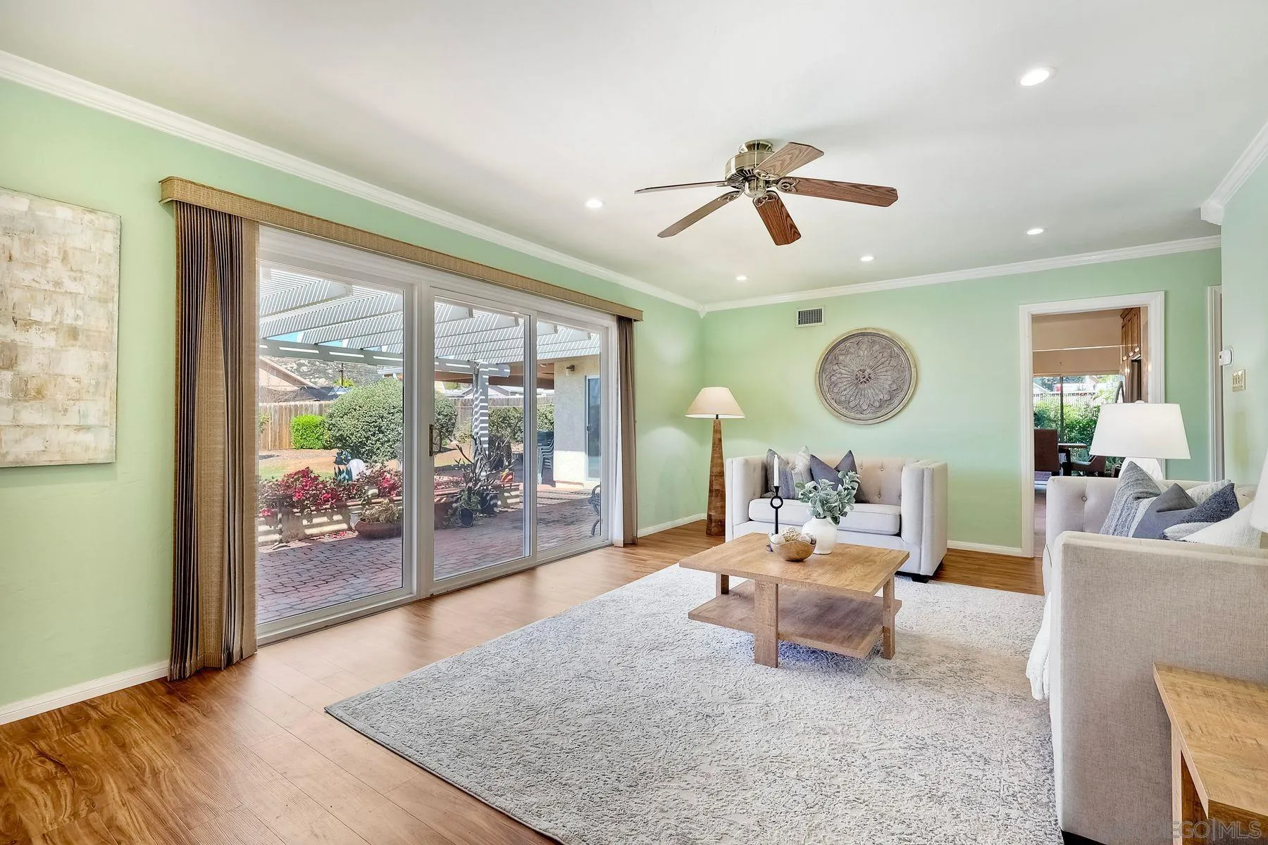 1346 Pepper Villa Drive El Cajon, CA 92021 - Photo 2 of 25 a living room with furniture and a large window