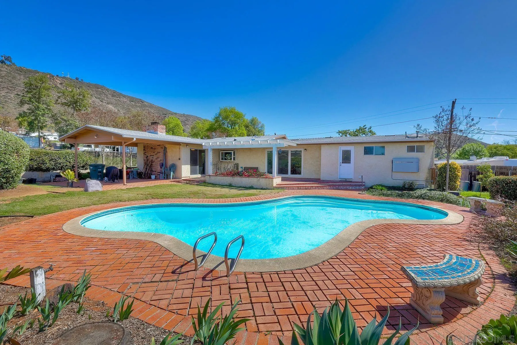 1346 Pepper Villa Drive El Cajon, CA 92021 - Photo 22 of 25 a view of a swimming pool with a patio