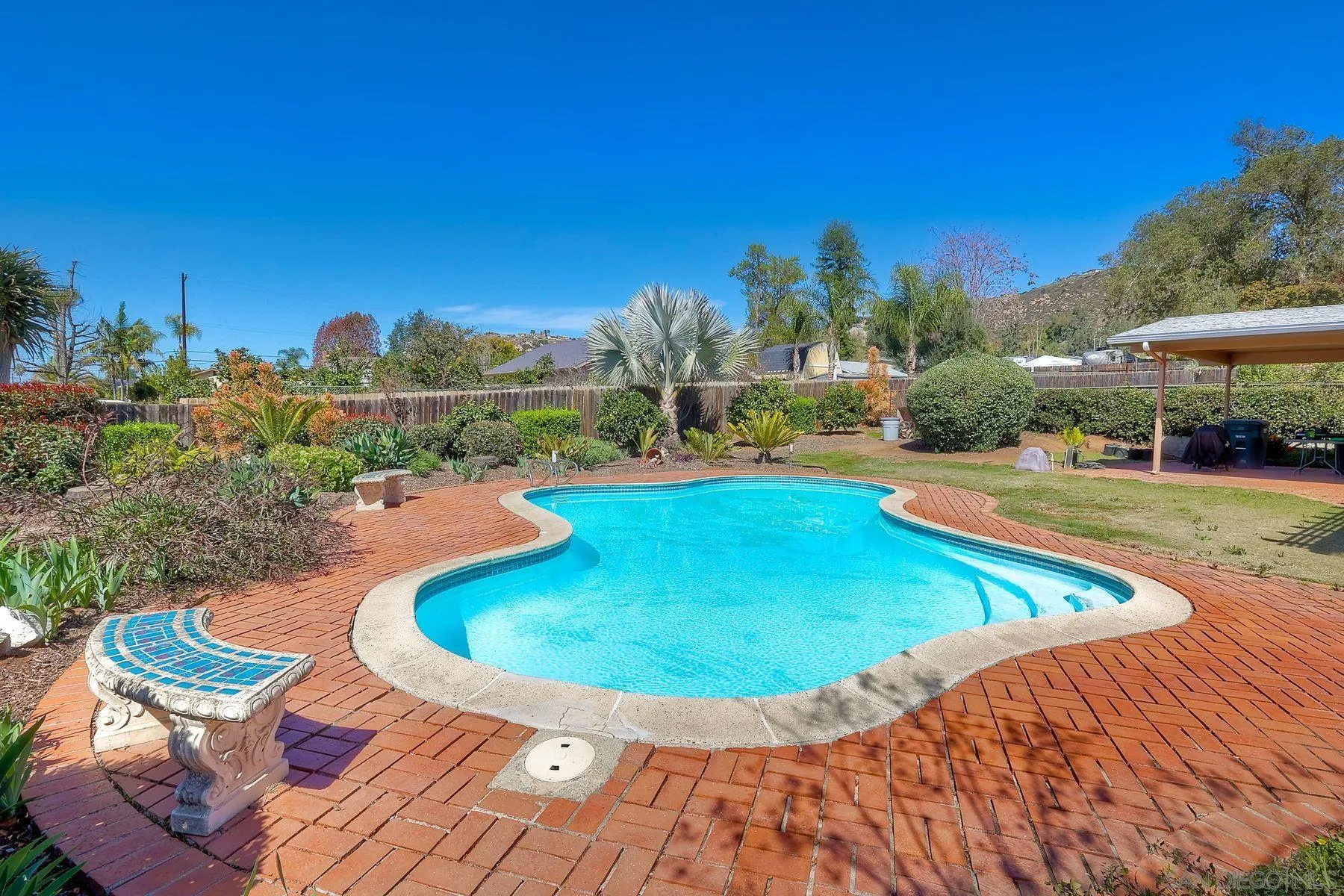 1346 Pepper Villa Drive El Cajon, CA 92021 - Photo 23 of 25 a view of a swimming pool with a yard