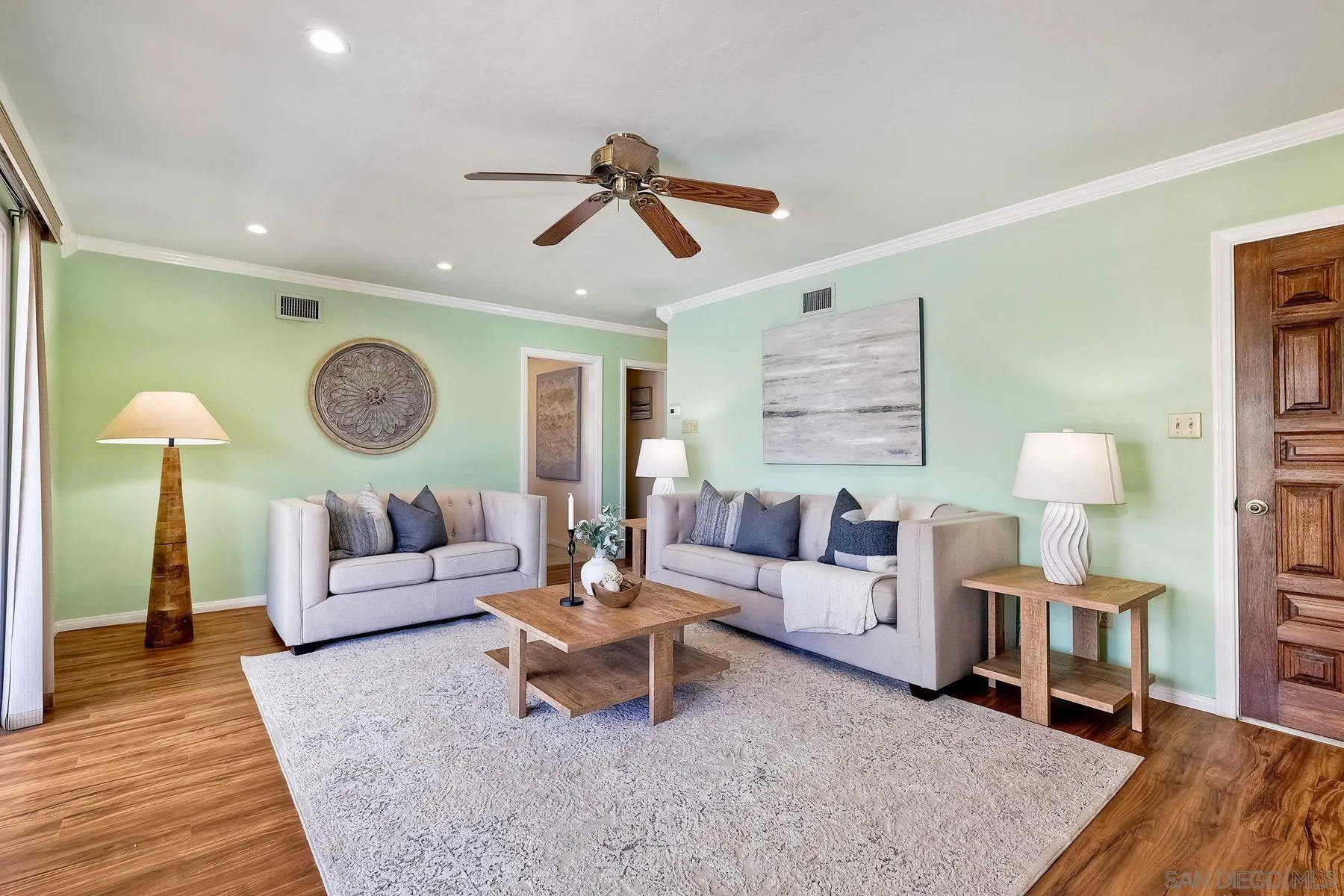 1346 Pepper Villa Drive El Cajon, CA 92021 - Photo 3 of 25 a living room with furniture and a wooden floor