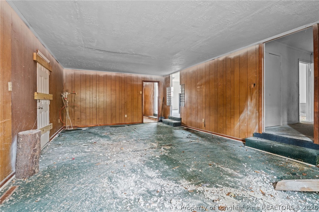 217 South Grove Avenue Rockingham, NC 28379 - Photo 15 of 37 a view of room with walk in closet