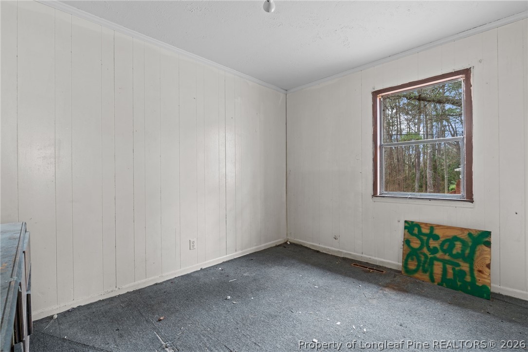 217 South Grove Avenue Rockingham, NC 28379 - Photo 21 of 37 a view of an empty room with a window