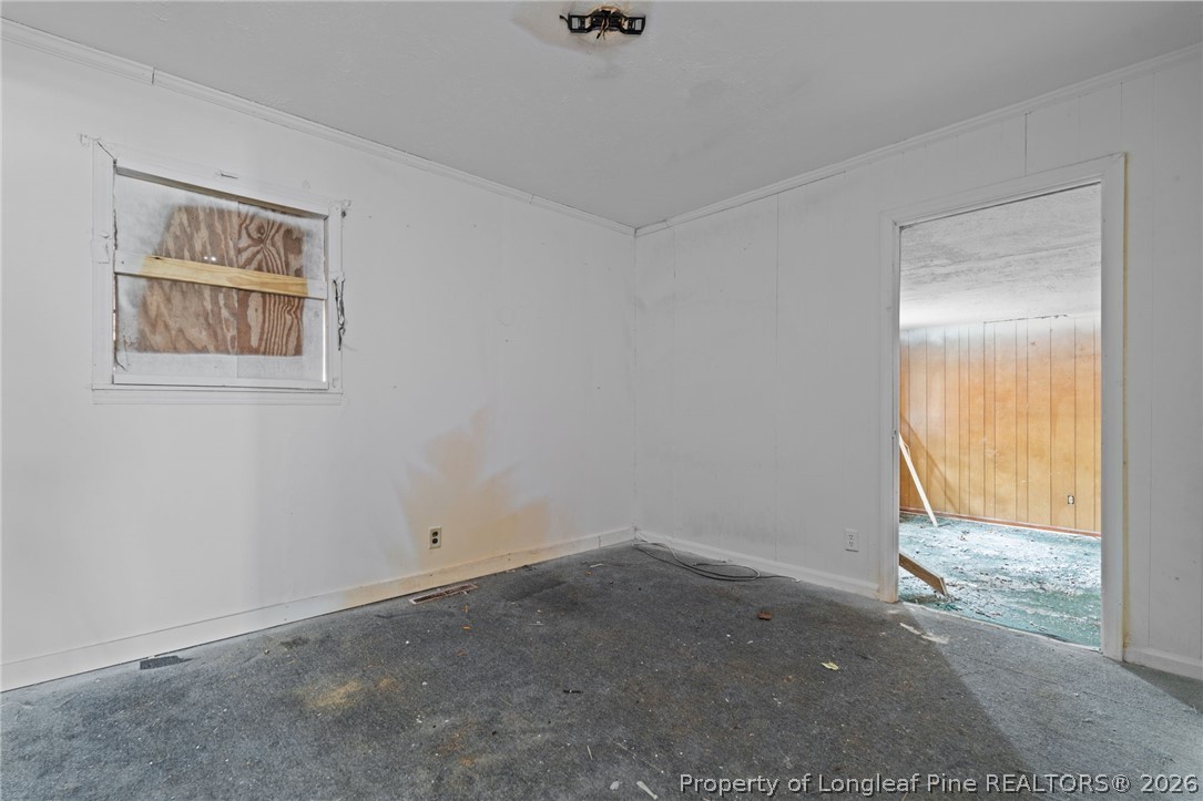 217 South Grove Avenue Rockingham, NC 28379 - Photo 25 of 37 an empty room with windows
