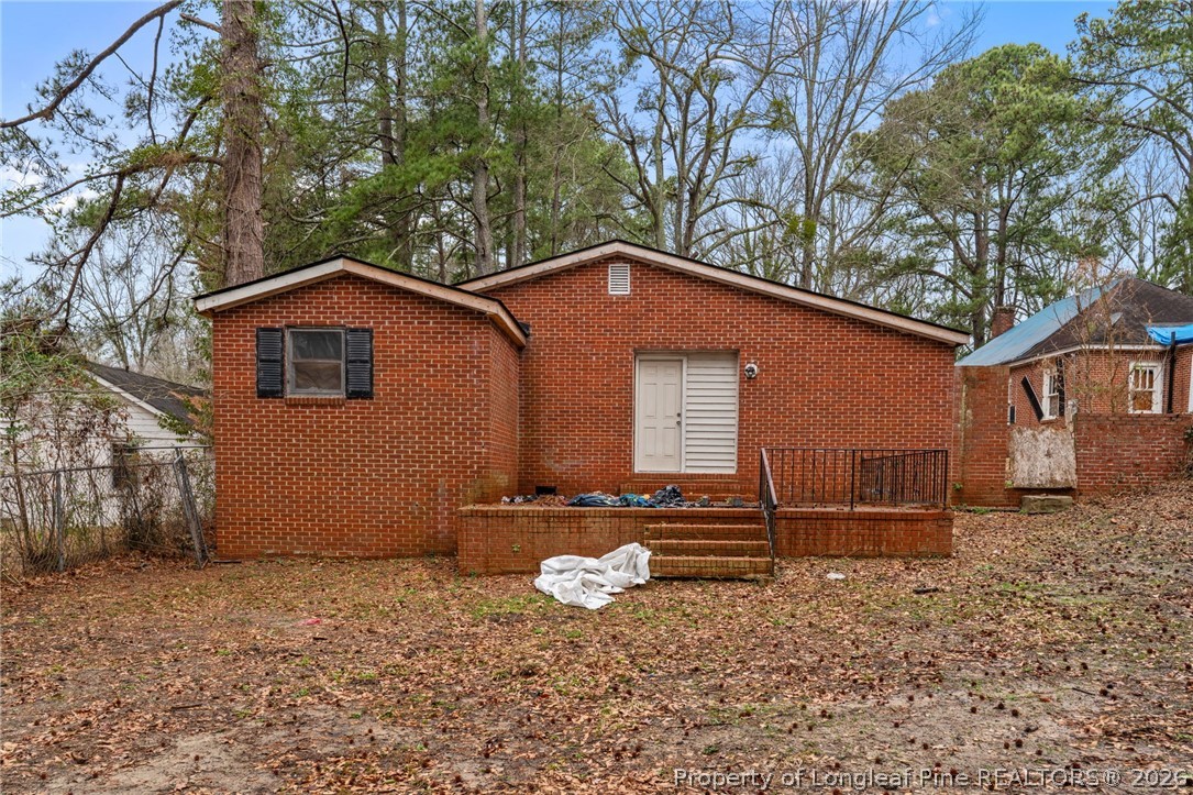 217 South Grove Avenue Rockingham, NC 28379 - Photo 29 of 37 a front view of a house with garden