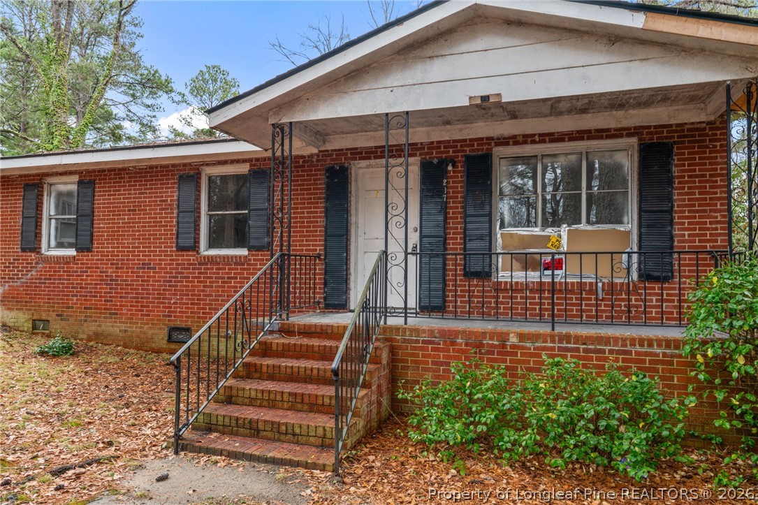 217 South Grove Avenue Rockingham, NC 28379 - Photo 35 of 37 front view of a house with a window
