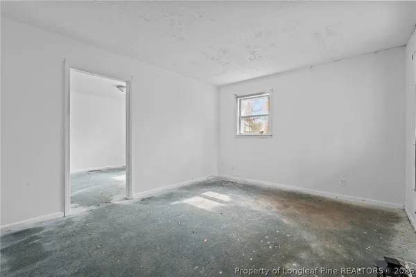 an empty room with windows