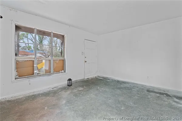 an empty room with a window