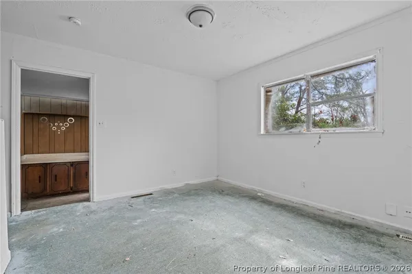 an empty room with closet
