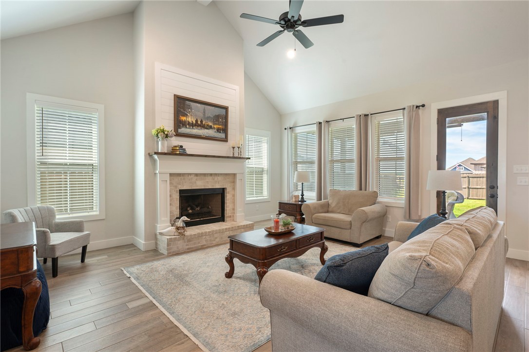 5019 Grayson Way Bryan, TX 77802 - Photo 3 of 26 Lovely fireplace with gas logs and starter.