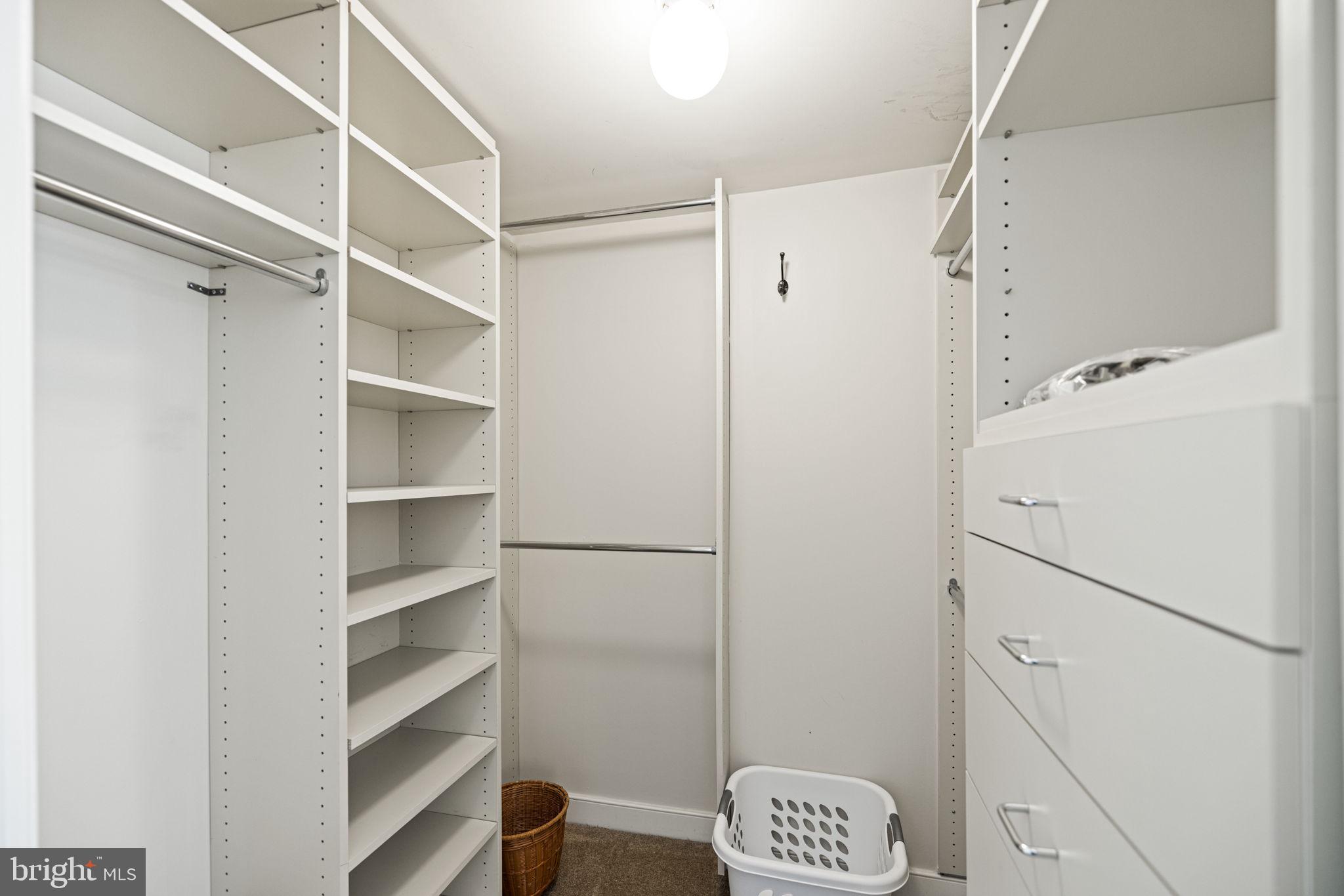 616 E Street Northwest, Unit 1152 Washington, DC 20004 - Photo 26 of 92 a view of walk in closet with empty racks