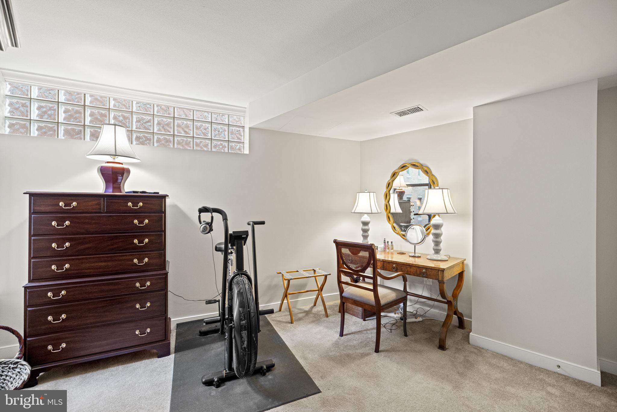 616 E Street Northwest, Unit 1152 Washington, DC 20004 - Photo 27 of 92 a view of a workspace with furniture