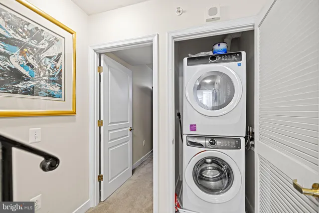 a view of a livingroom with furniture and window in a room