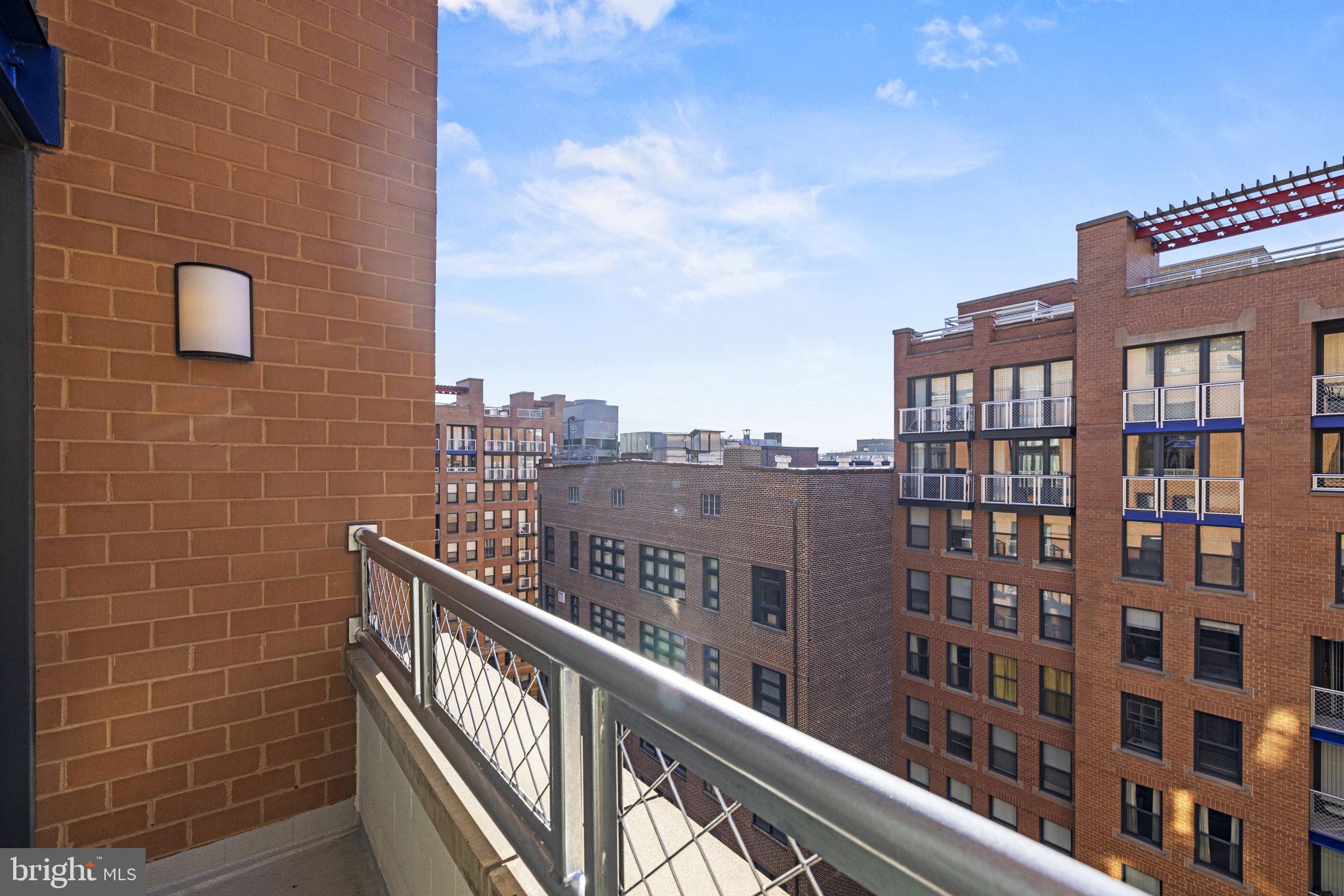 616 E Street Northwest, Unit 1152 Washington, DC 20004 - Photo 36 of 92 a view of a building from a balcony