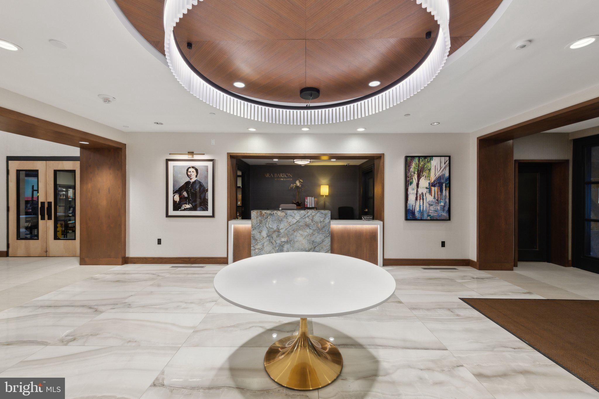 616 E Street Northwest, Unit 1152 Washington, DC 20004 - Photo 42 of 92 a view of a livingroom with furniture and window in a room
