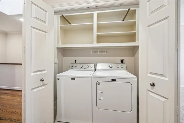 a utility room with dryer and washer