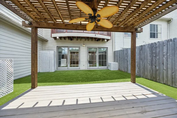 a view of a brick house with a garden