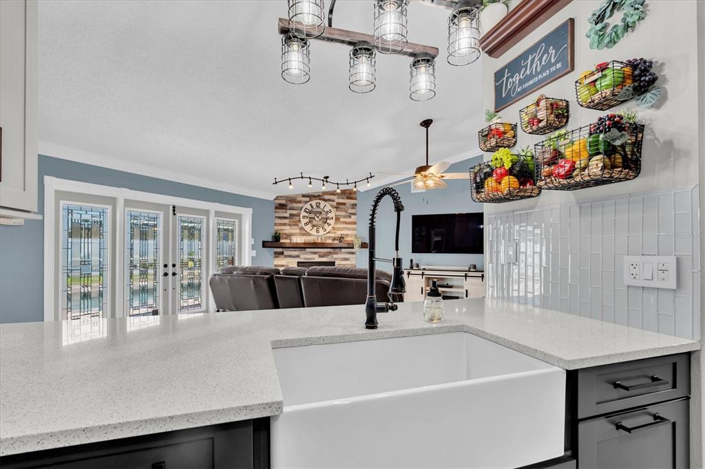 1170 Falcon Ridge Lane Palm Harbor, FL 34683 - Photo 12 of 35 a view of a dining room with a table and chairs