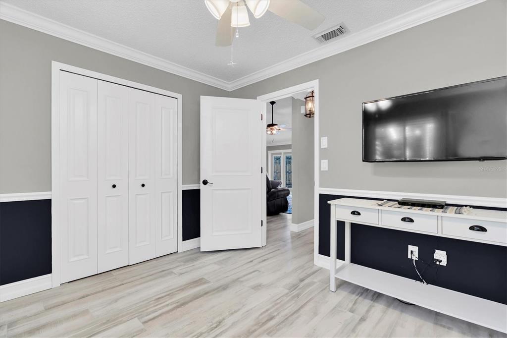 1170 Falcon Ridge Lane Palm Harbor, FL 34683 - Photo 21 of 35 a view of a livingroom with wooden floor