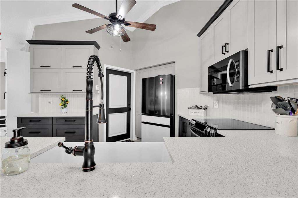 1170 Falcon Ridge Lane Palm Harbor, FL 34683 - Photo 10 of 35 a view of living room with furniture and flat screen tv