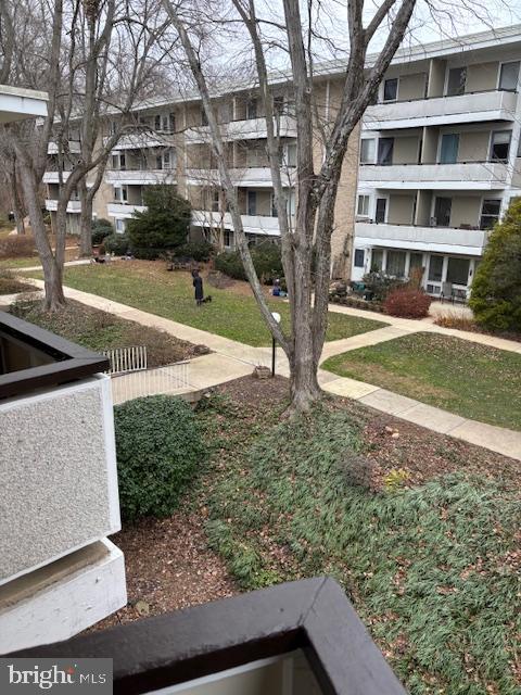 7515 Spring Lake Drive, Unit D2 Bethesda, MD 20817 - Photo 7 of 8 a view of building with yard