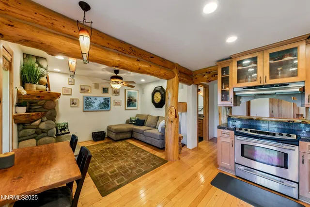 a kitchen with stainless steel appliances granite countertop a stove and a refrigerator