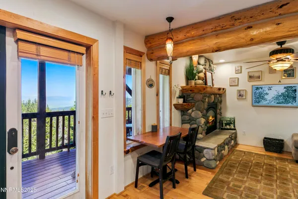 a view of a workspace with wooden floor