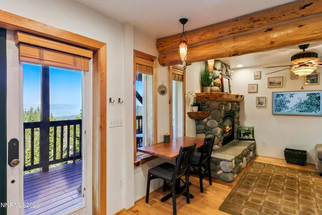 a view of a workspace with wooden floor