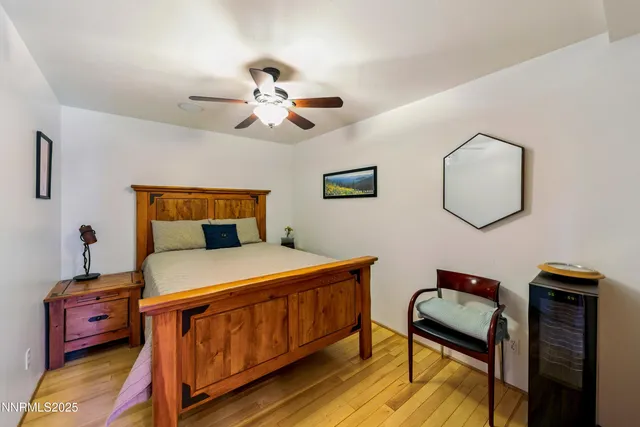 a bedroom with furniture and a window