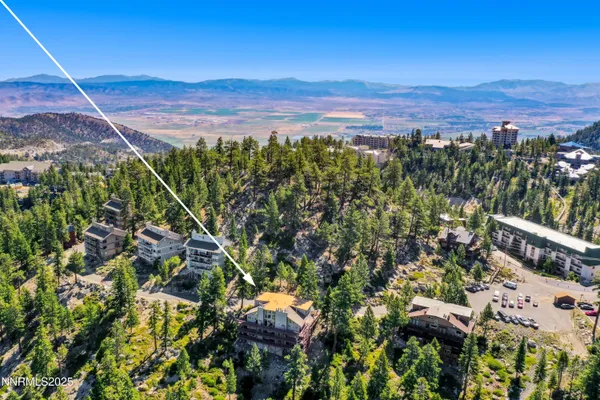 a view of a city with mountain