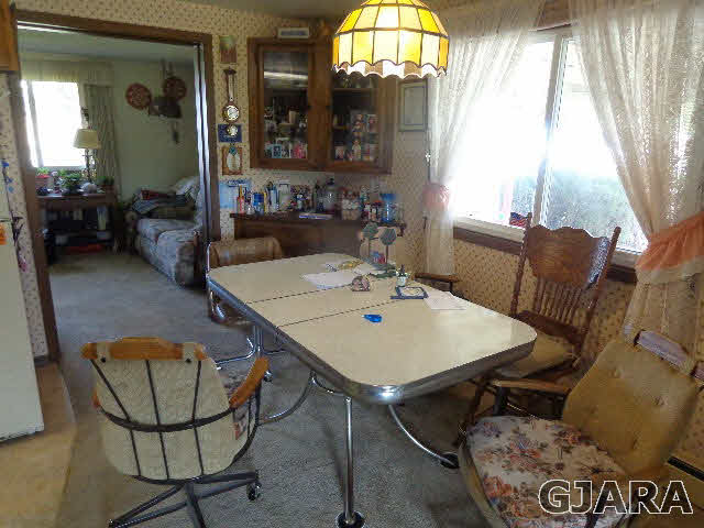 2049 I Road Fruita, CO 81521 - Photo 30 of 30 a view of a dining room with furniture window and outside view