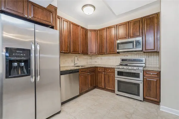 $989,000 | 8403 19th Avenue, Unit 1A | Van Pelt Manor