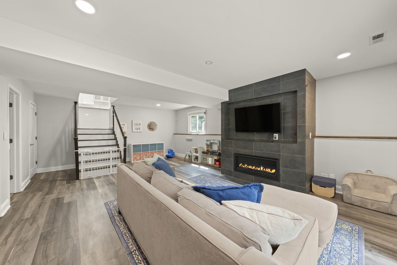 1940 Green Trails Drive Lisle, IL 60532 - Photo 13 of 31 a living room with furniture and a flat screen tv